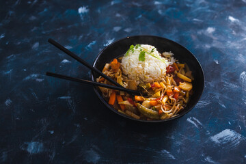 plant-based food, vegan sticky rice with stir fry vegetables in sweet and sour sauce