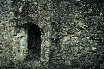 old stone wall with cracks