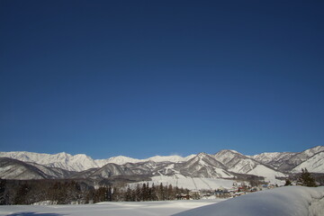Daytime shot of snowed mountains in northern alps of Japan, Hakuba
