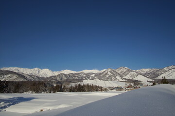 Daytime shot of snowed mountains in northern alps of Japan, Hakuba