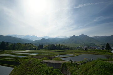 Spring has come in countryside of Japan, mountains and rice fields in Hakuba 