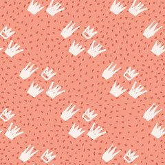 Crown white ornament seamless pattern. Coral background with dots. Hand drawn art work.