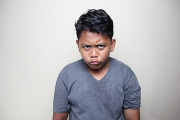 photos of various Asian boy facial expressions