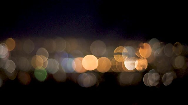 Blurry lights of the city at night