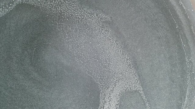Aluminum powder paint pigment particle convection movement in solvent acetone simulating Suns surface granules