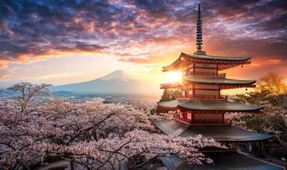 Wall murals Fuji Fujiyoshida, Japan Beautiful view of mountain Fuji and Chureito pagoda at sunset, japan in the spring with cherry blossoms