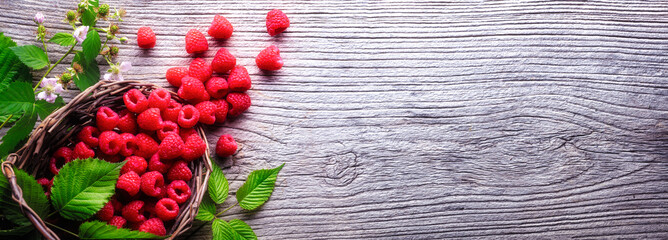 Raspberry on wooden board © powerstock