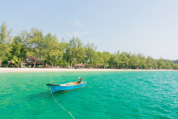 A small boat at the beach of Koh Rong Island, Cambodia