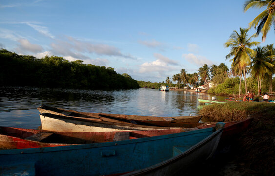 conde, bahia / brazil - february 24, 2015: boats are seen in waters of the Itapicuru river in the Pocas district in the city of Conce, on the northern coast of Bahia.
