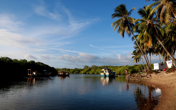 conde, bahia / brazil - february 24, 2015: boats are seen in waters of the Itapicuru river in the Pocas district in the city of Conce, on the northern coast of Bahia.