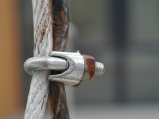 A magnified detail of the wire rope that rusted on the surface of the metal beautifully