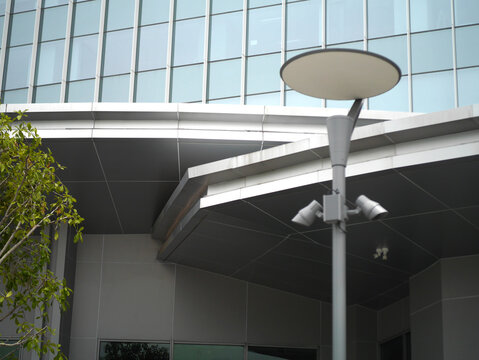 Picture of outdoor light post and CCTV in public places