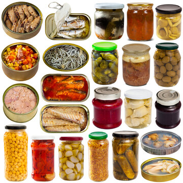 Assorted Various Canned Goods With Meat, Vegetables And Seafood On A White Background. High Quality Photo