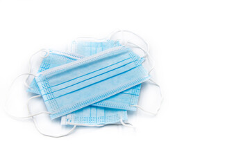 Single use medical face masks isolated over white background, corona virus protection concept