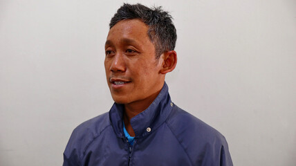 selective focus image Old men wear jackets with various expressions, noise and blurry 