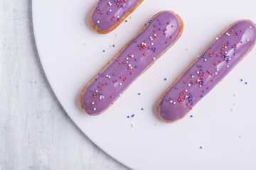 delicious cake with icing on a white plate