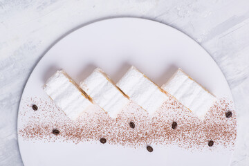delicious cake on a white plate, top view