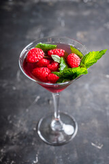 Raspberry martini cocktail. Selective focus. Shallow depth of field.
