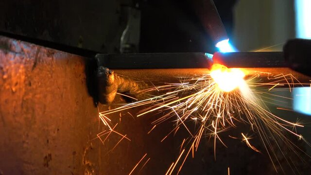 Low angle of Track Burner spewing sparks