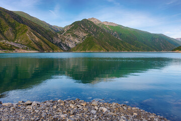 Beautiful mountain turquoise color lake Karasuu. Kyrgyzstan.