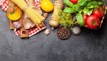 Italian cuisine ingredients. Tomatoes, pasta, herbs and spices