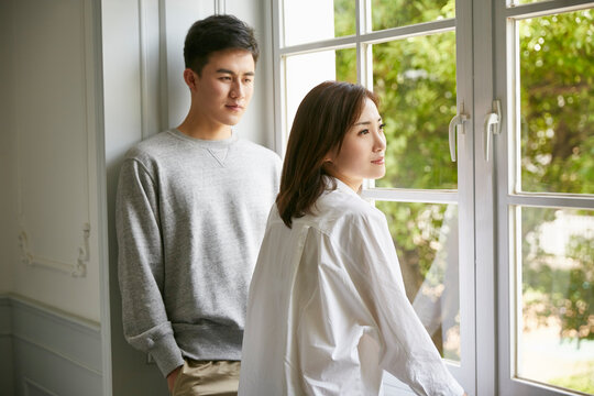 young asian couple staying at home