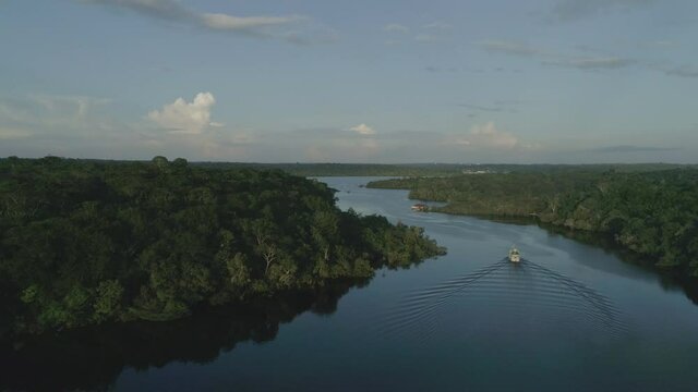 River in the Amazon, aerial view, with boats and ships early morning