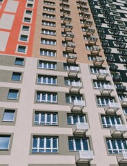 panoramic and perspective view from the bottom up on the facade of a high-rise building.