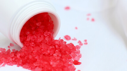 Red natural mineral salt in on white cloth