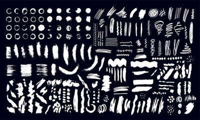A large set of abstract elements for design. Hand drawn black and white vector illustration. Spots, blots, lines, circles, circles, waves. Rough texture. Careless strokes of paint.