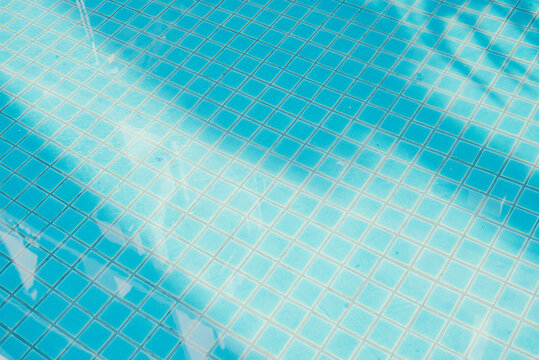 Blue water in swimming pool texture 