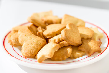 Homemade butter cookies on a dish in beautiful sunlight