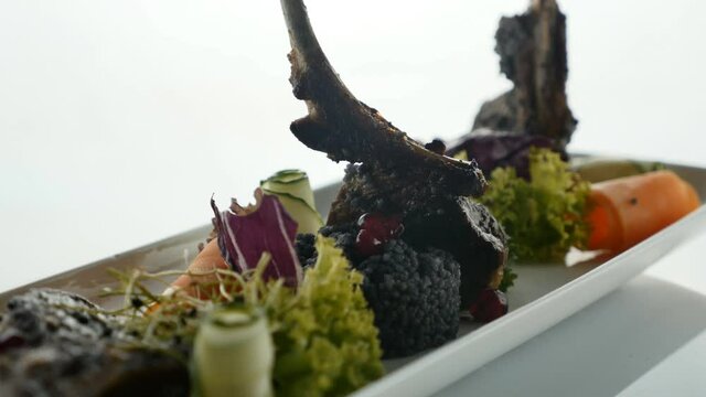 Delicious appetizers, tapas food. Luxury Molecular Dish with Sliced Veal Meat.