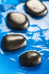 Obraz na płótnie Canvas Wet Pebbles / Stones