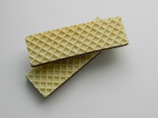 Two waffles on a white background
