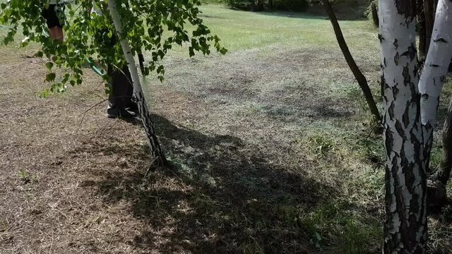 Hydroseeding of lawn grass on the lawn of a country house. High quality 4k footage