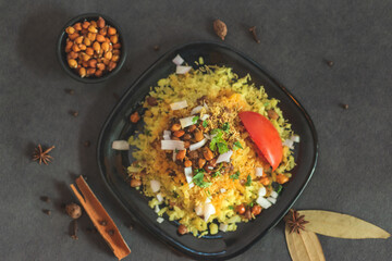 Sprouts and Poha . Deliciously steamed beaten rice, fragrant poha that is a breakfast staple in all of India . Eat with sprouts and tomatoes. 