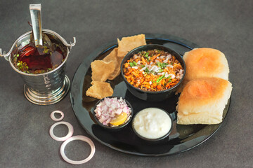 Misal is a meal of curry made from multiple sprouts, spices and served with a common bread.  It is spicy and hot in taste. 