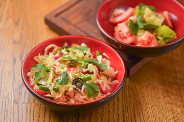 Vegetable salad with tomatoes, pepper, cucumbers, cabbage and mushrooms. Fresh organic veggies. Vegan, vegetarian diet.
