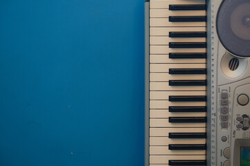 Piano keys on blue background