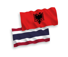 Flags of Albania and Thailand on a white background