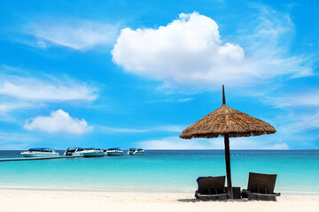 tropical beach with blue lagoon and sky and cloud, Concept for traveling, relax, work and life