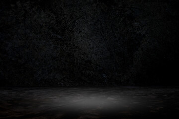 old grunge dark room or empty black room with spotlight to concrete ground for interior decoration, studio or advertising concept