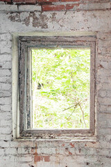 Window opening of an abandoned house without glass