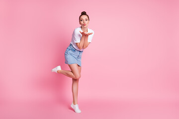 Fototapeta na wymiar Full length photo of attractive charming girl enjoy valentine day rest relax send air kiss wear good look clothes sneakers isolated over pastel color background
