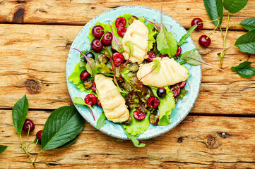 Summer green salad with berry.
