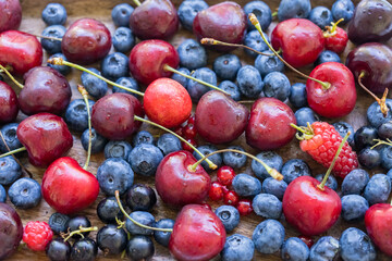 Cherries, blueberries, raspberries, and currants - top view