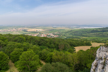 Fototapeta na wymiar Vineyard landscape with hills, small village and dam Nove mlyny, Palava Czech republic