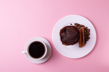 espresso in a white ceramic cup on pink
