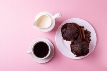 espresso in a white ceramic cup on pink